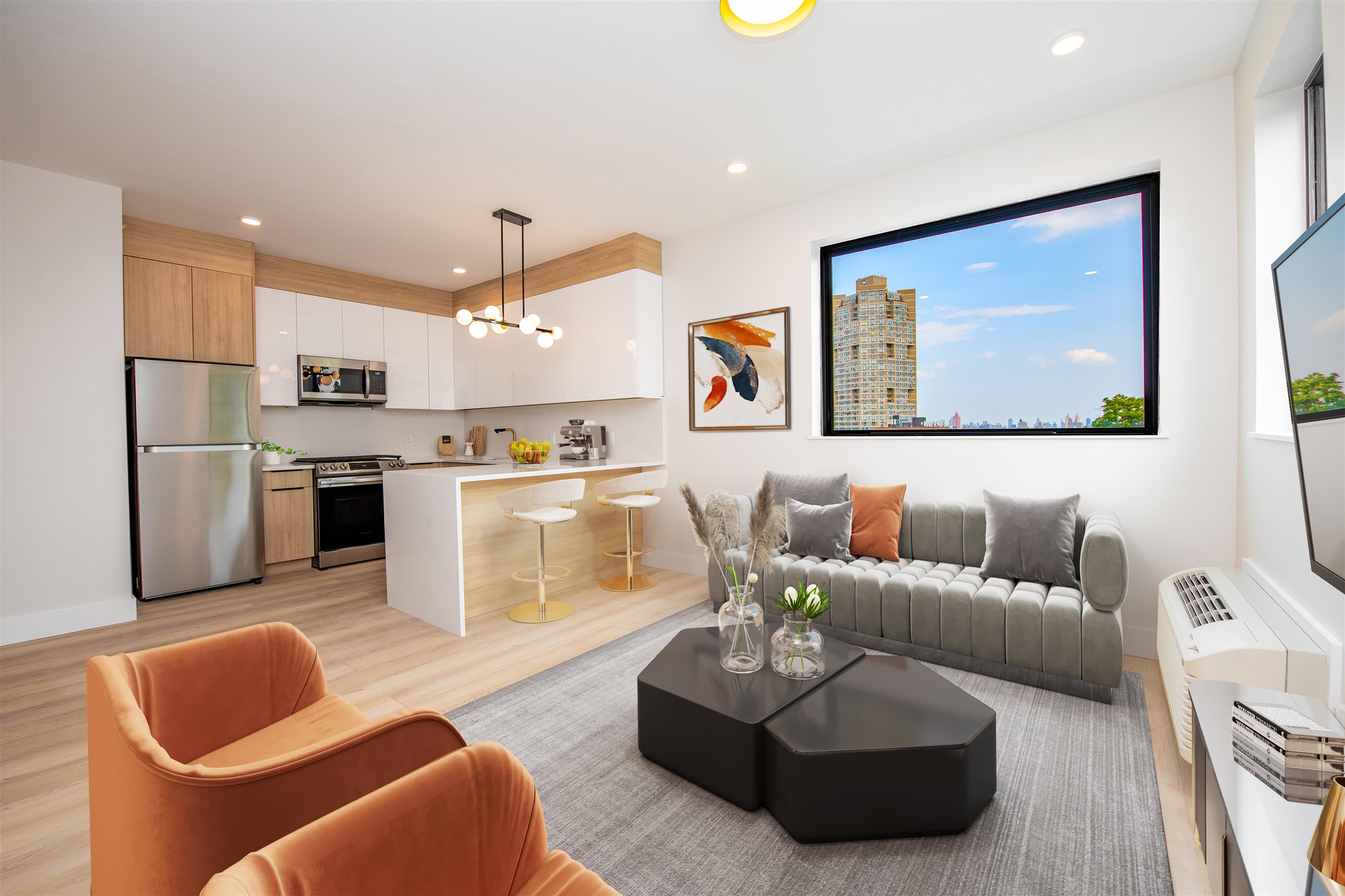 a living room with furniture kitchen view and a chandelier