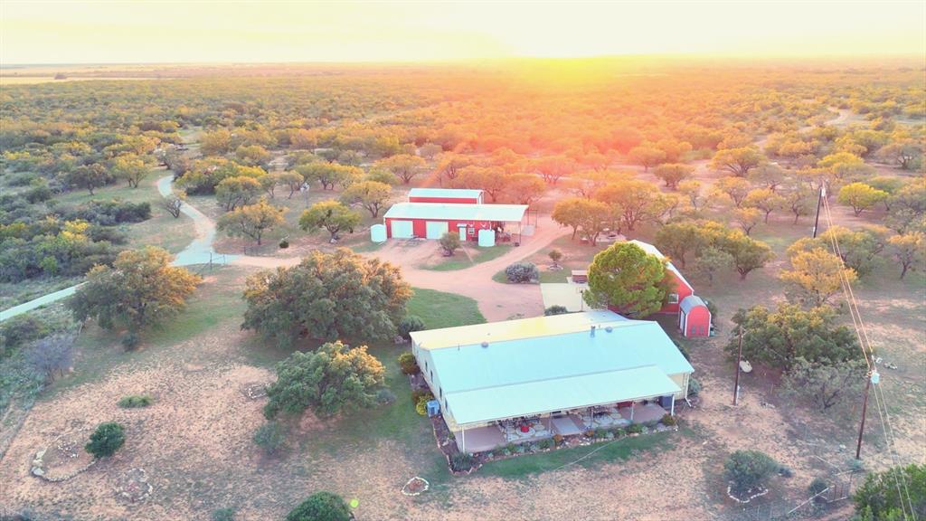 an aerial view of a house with a garden