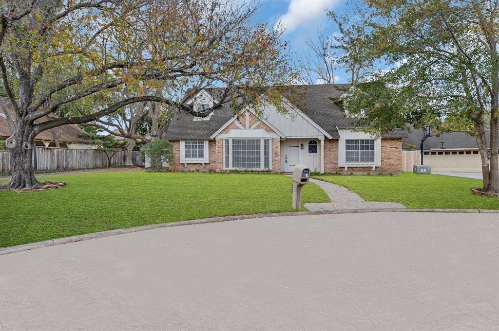 a house view with a garden space