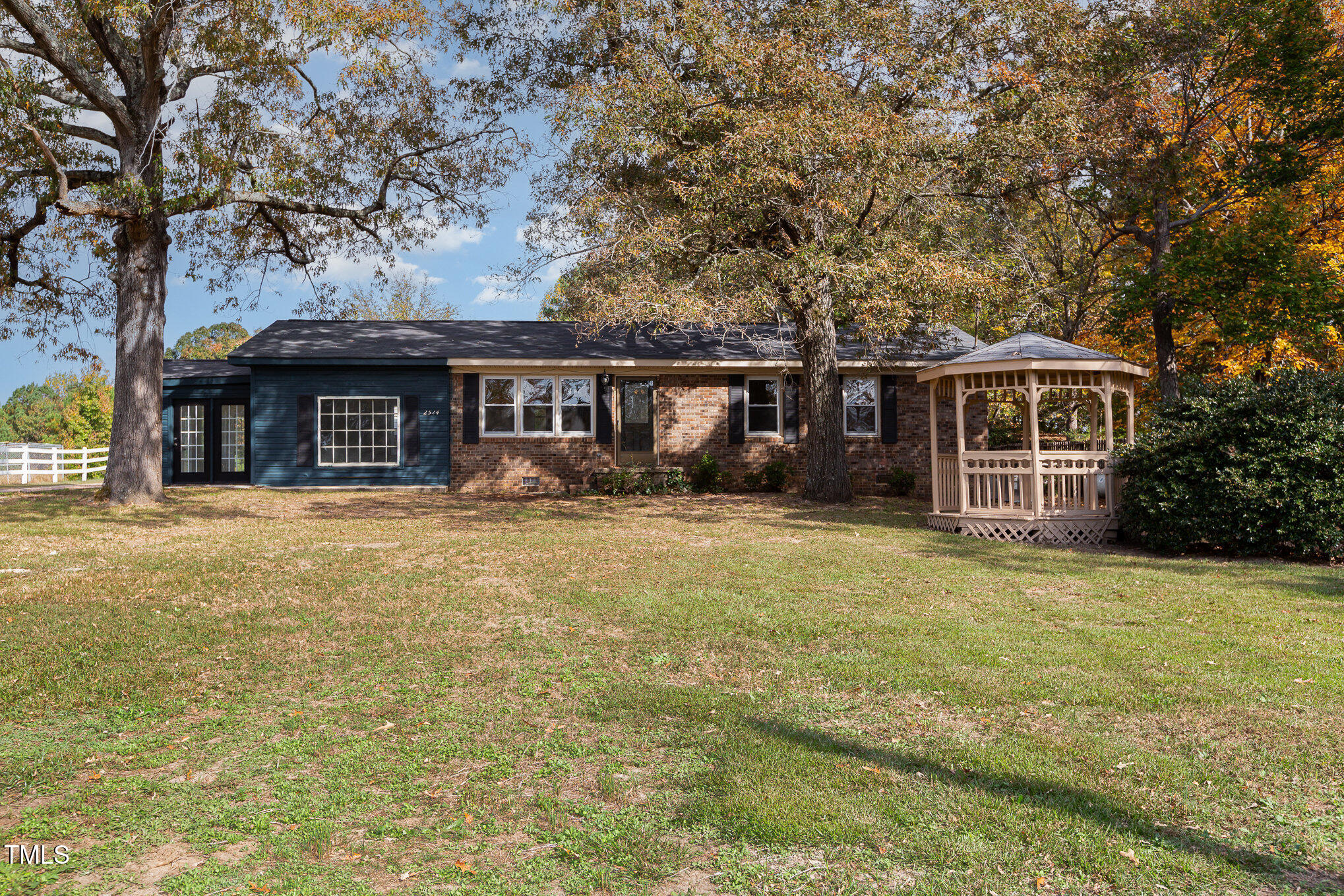 front view of a house with a yard