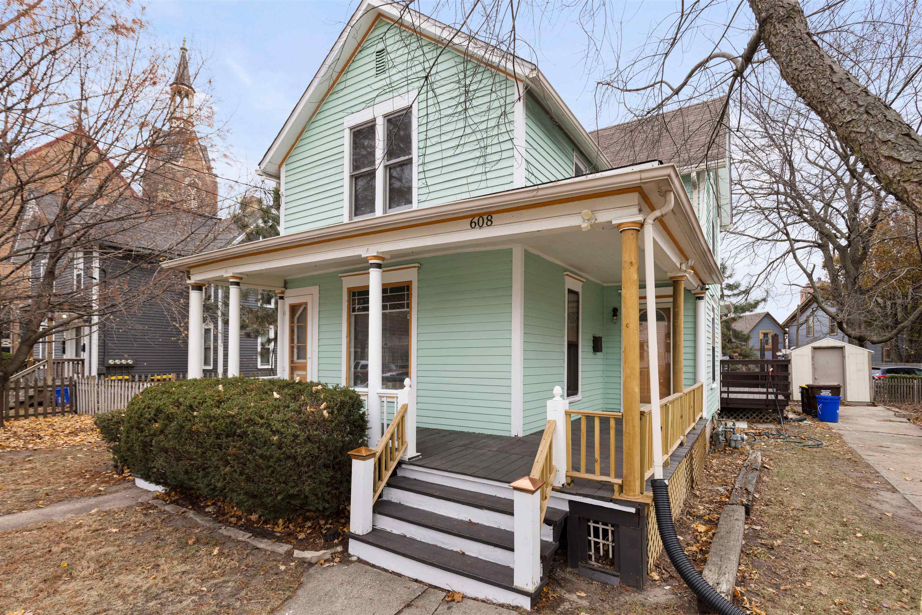 front view of a house with a small yard