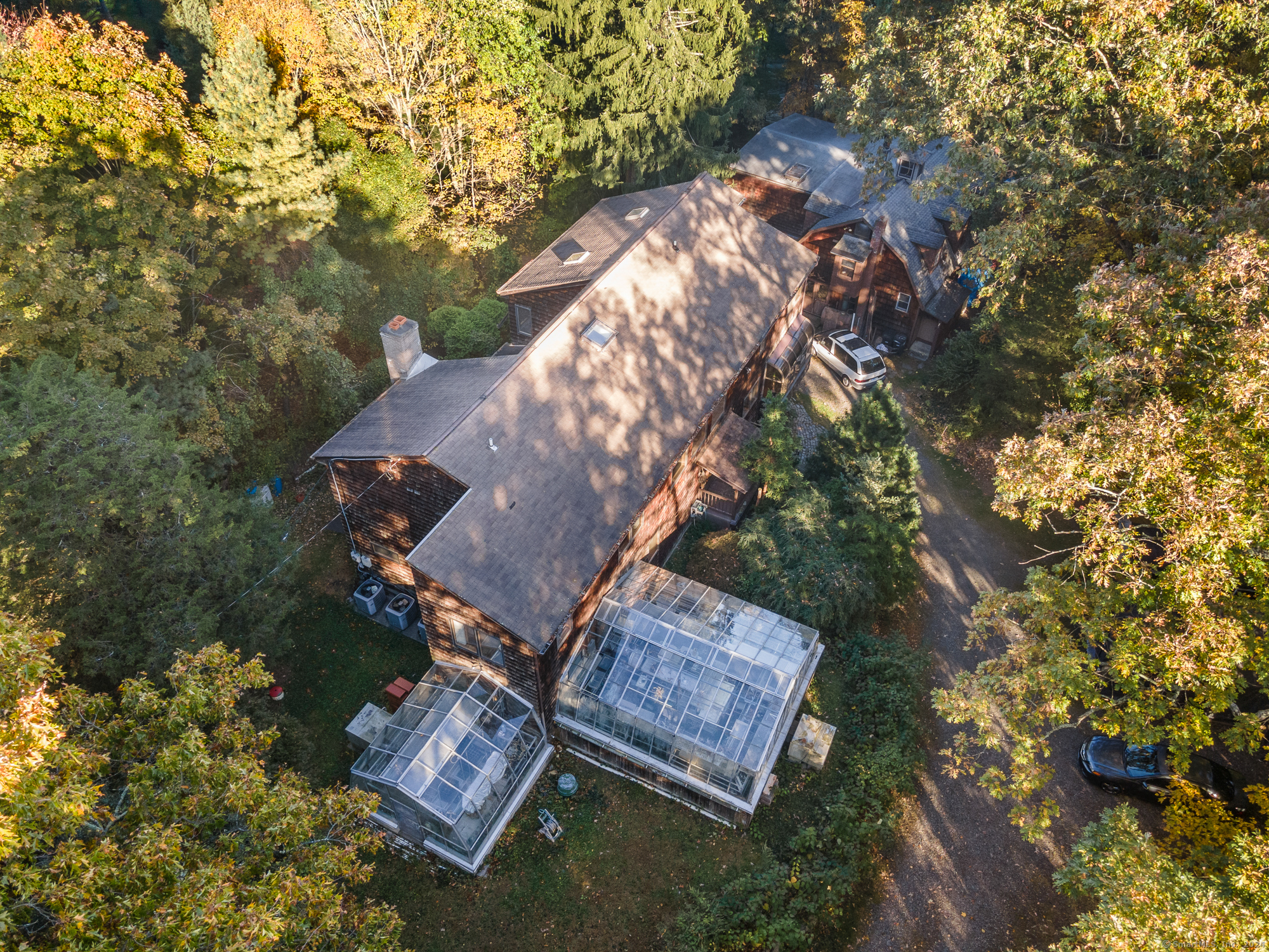 an aerial view of residential house with outdoor space