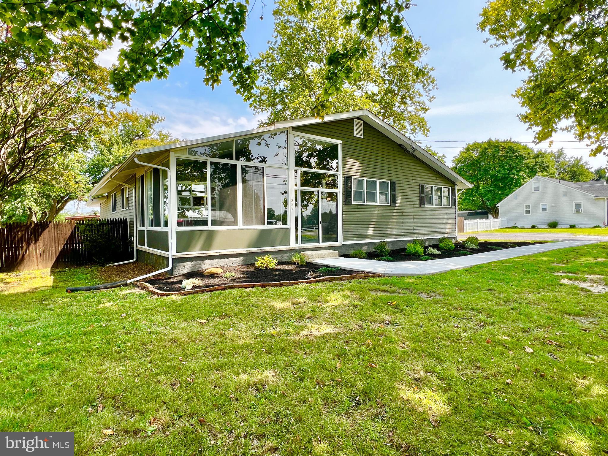 Beautiful sunroom out front!