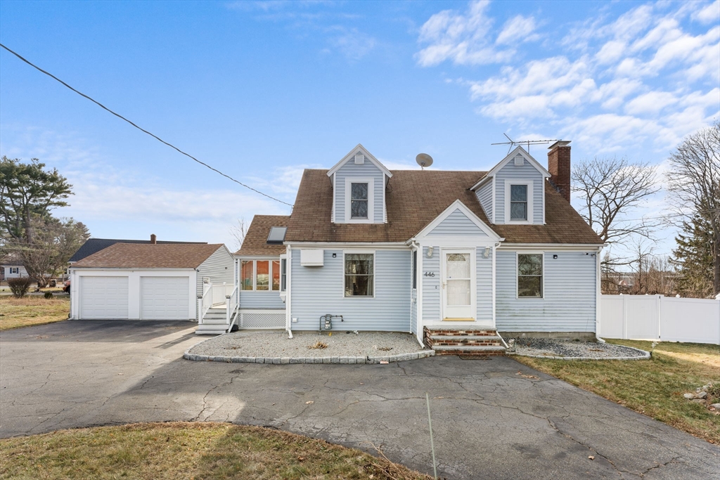 a view of a house with a street