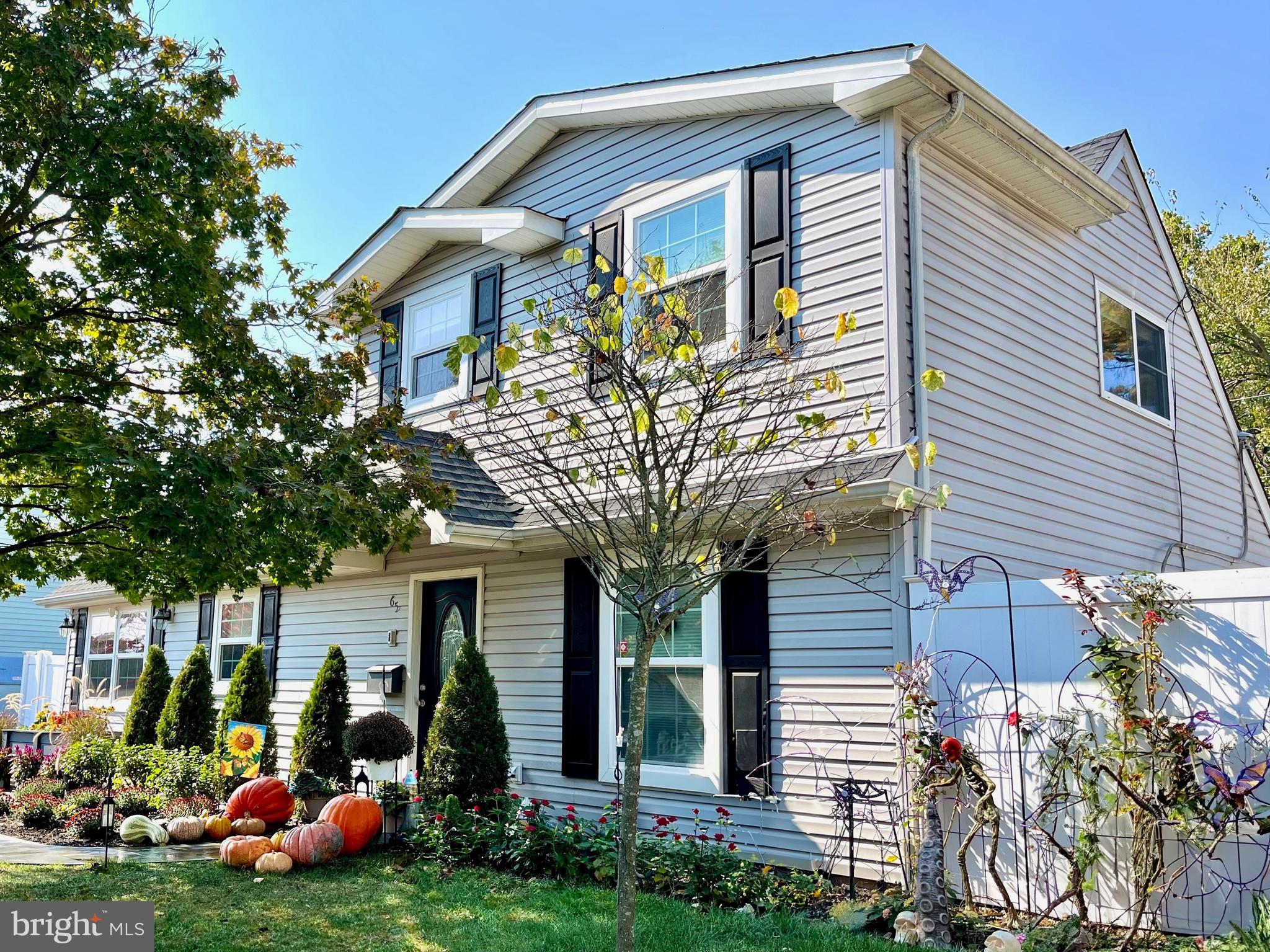 a front view of house with yard