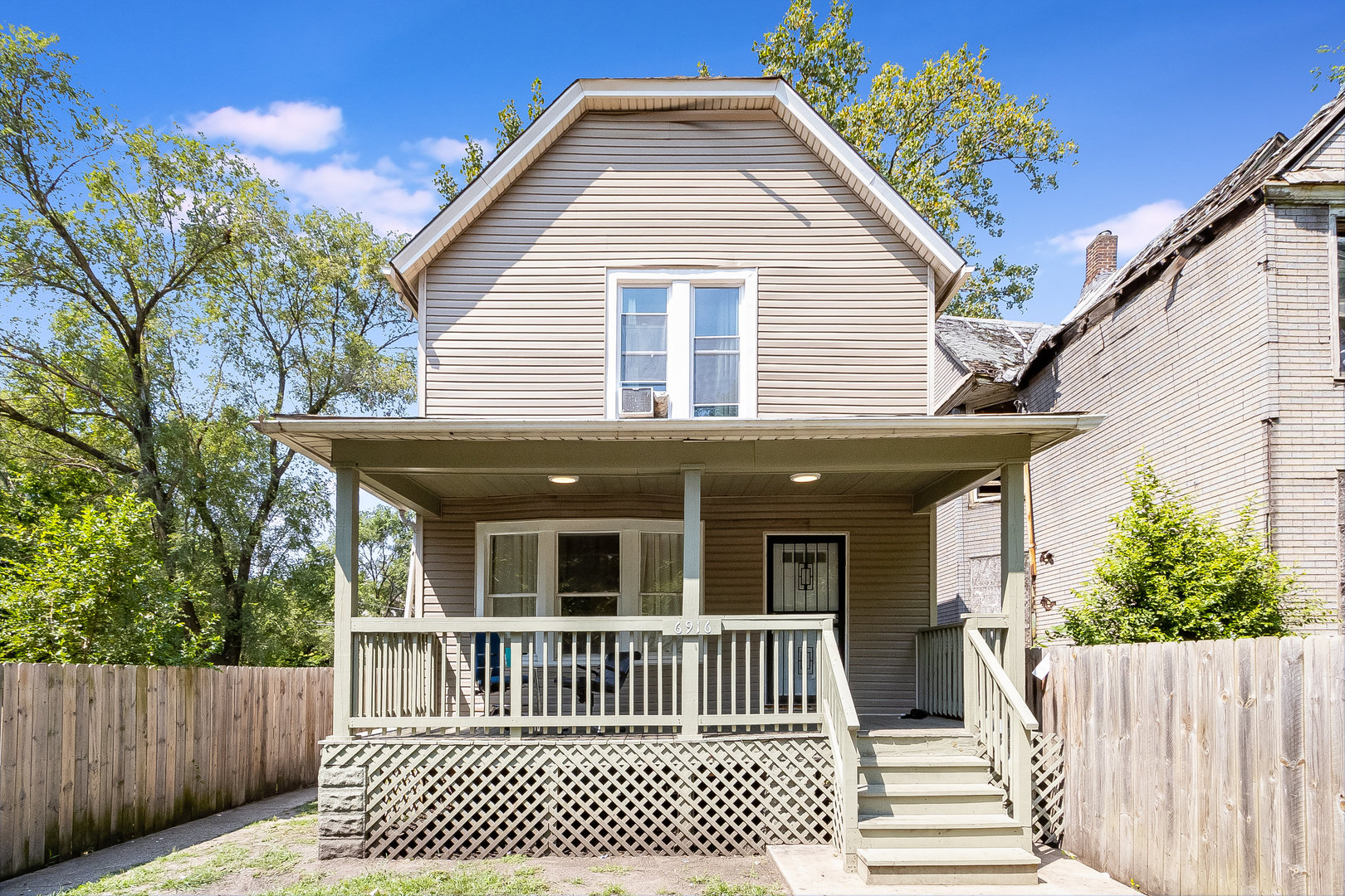 a view of a house with a deck