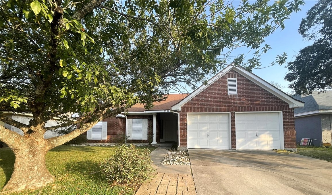 a house with trees in the background