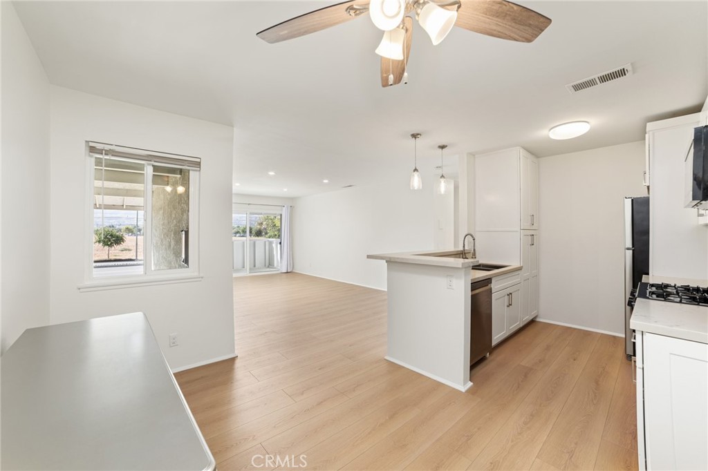 Kitchen, Dining Room, Living Room, and Outside Balcony View