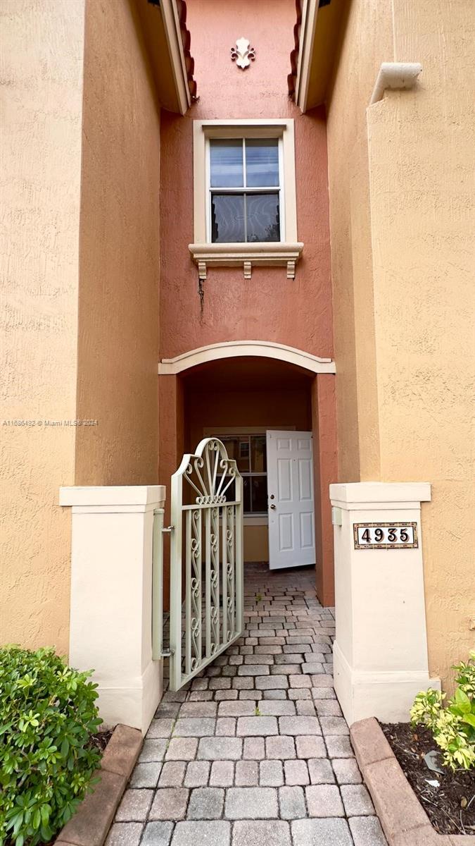 a front view of a house with entryway