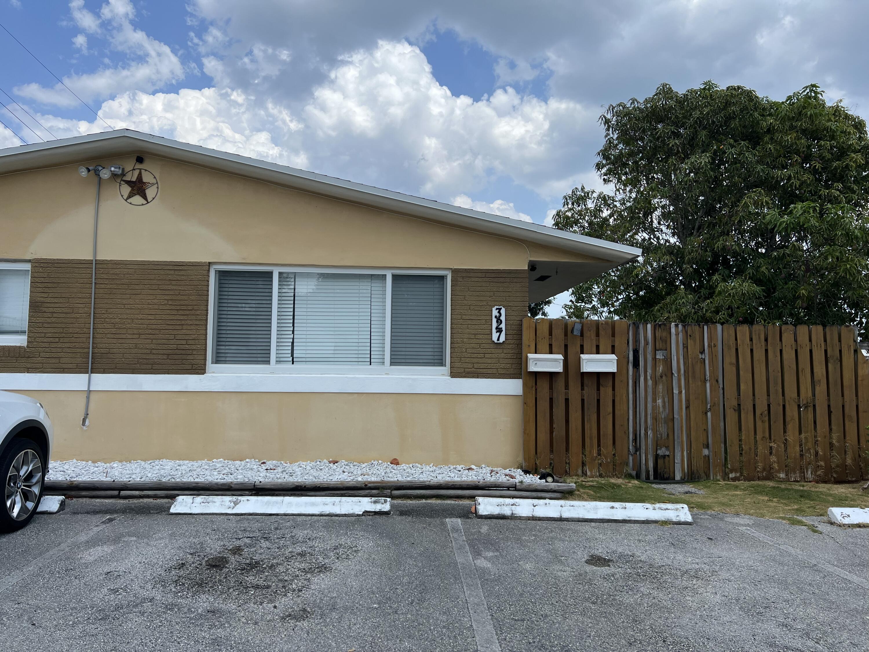 a view of outdoor space and front view of a house