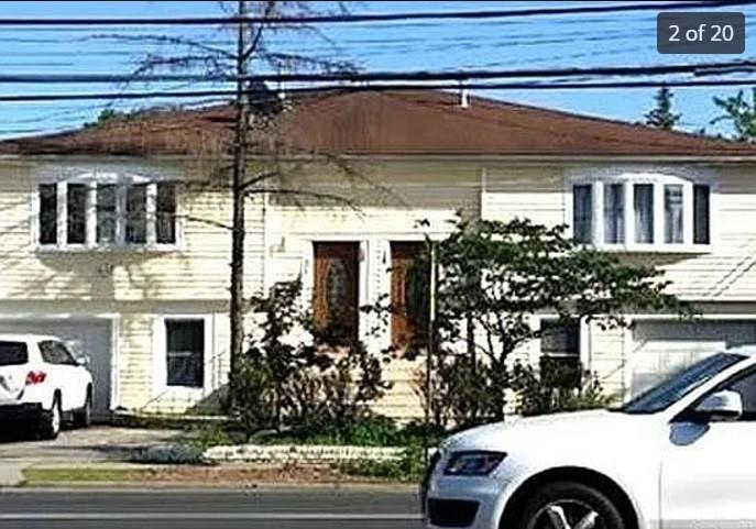 a view of a house with a balcony