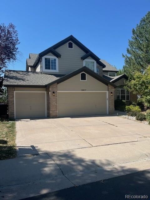 a front view of a house with a garage