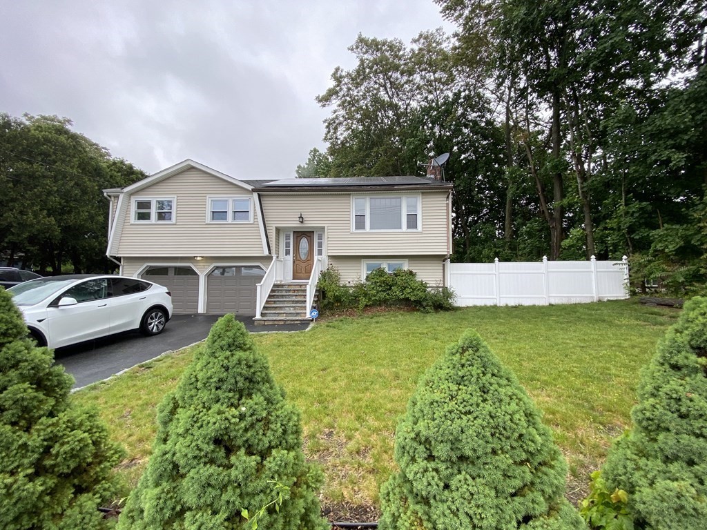 a house view with a garden space