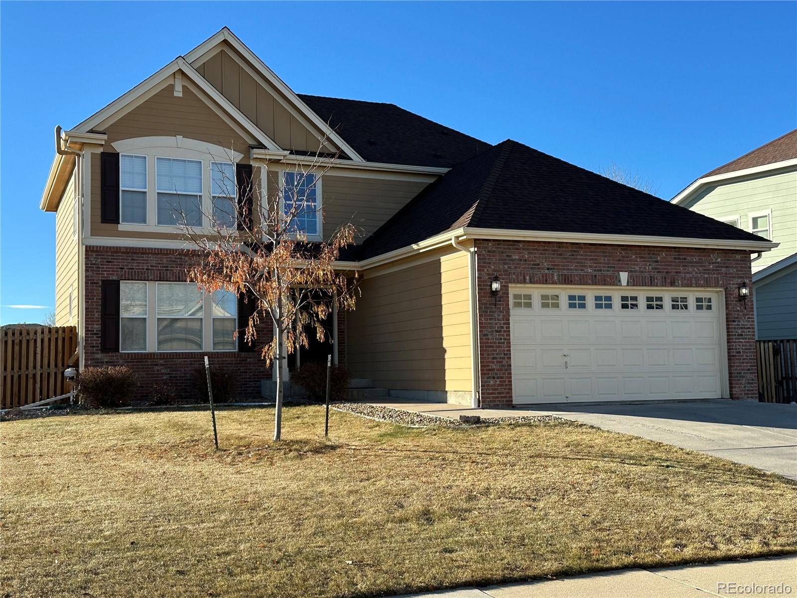 a front view of house with garage