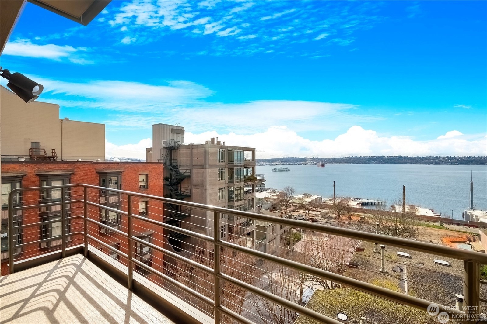 a view of a balcony with an ocean view