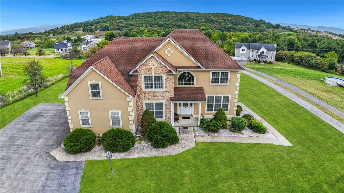 View of front of home with a front yard