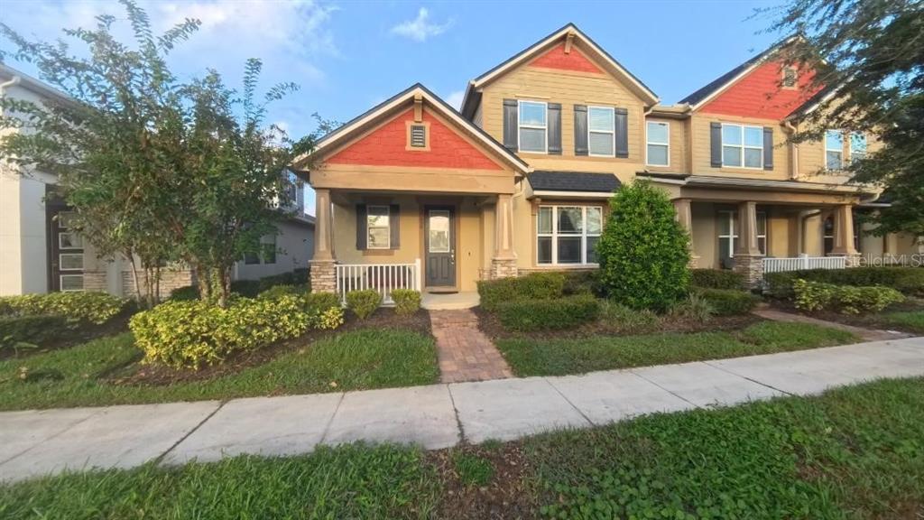 a front view of a house with yard