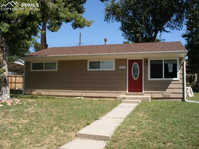 a house with trees in the background