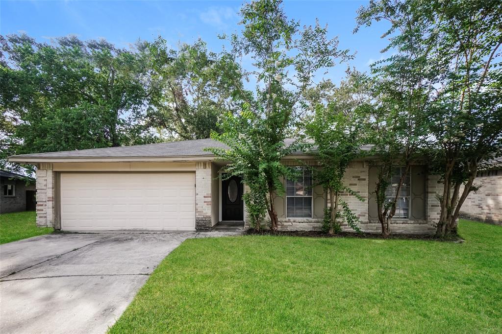 front view of house with a yard