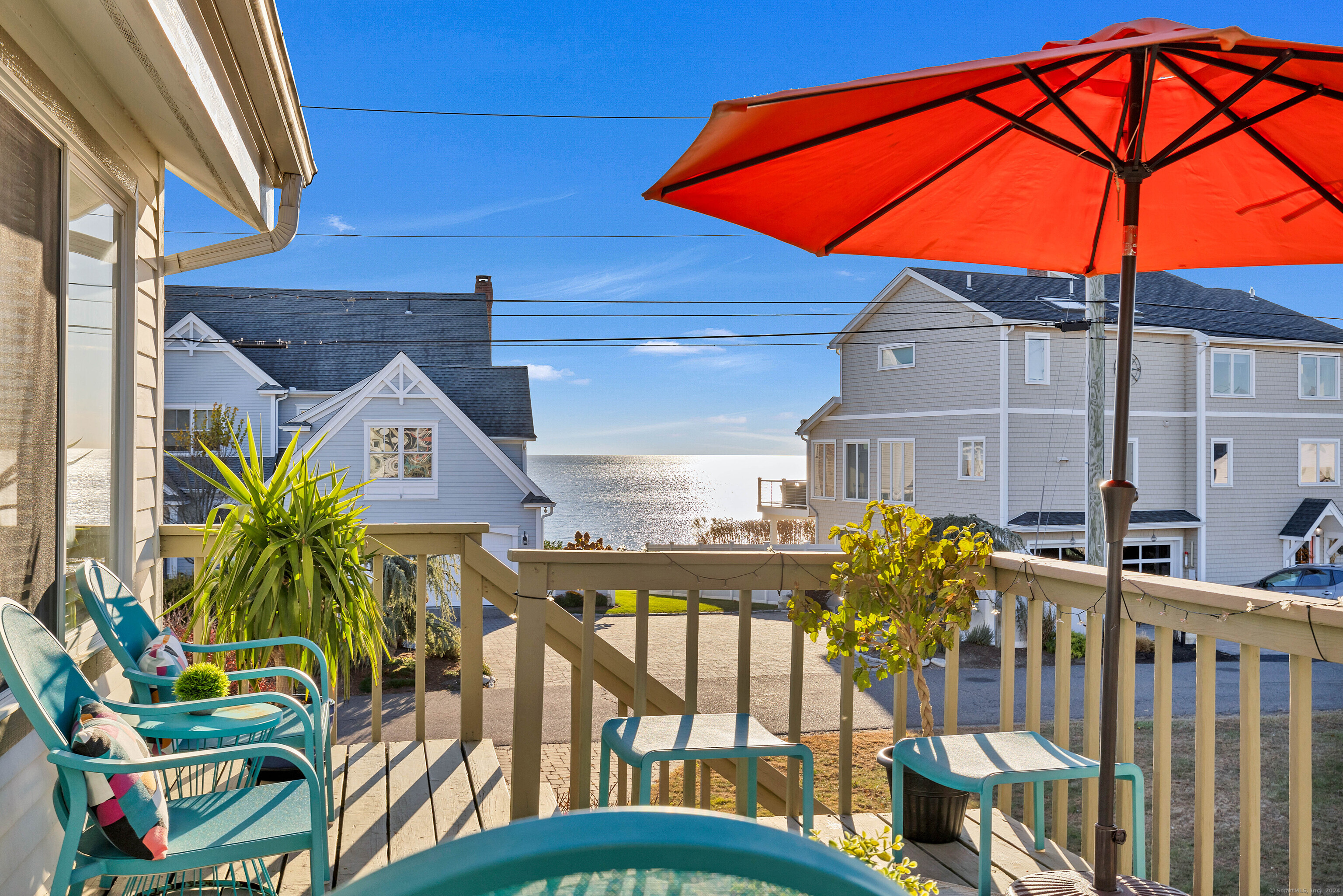 a view of an chairs and tables in the patio