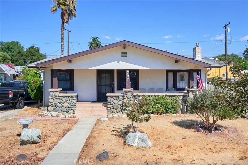 a front view of a house with a yard and outdoor space