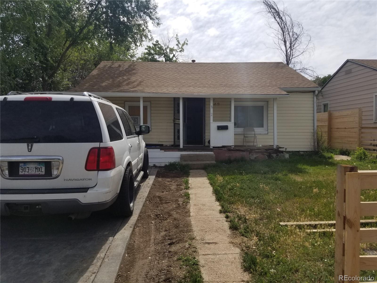 a view of a back yard of the house