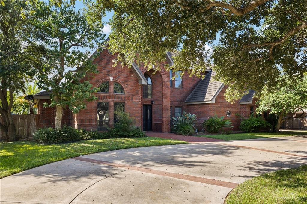 View of front of property with a front lawn