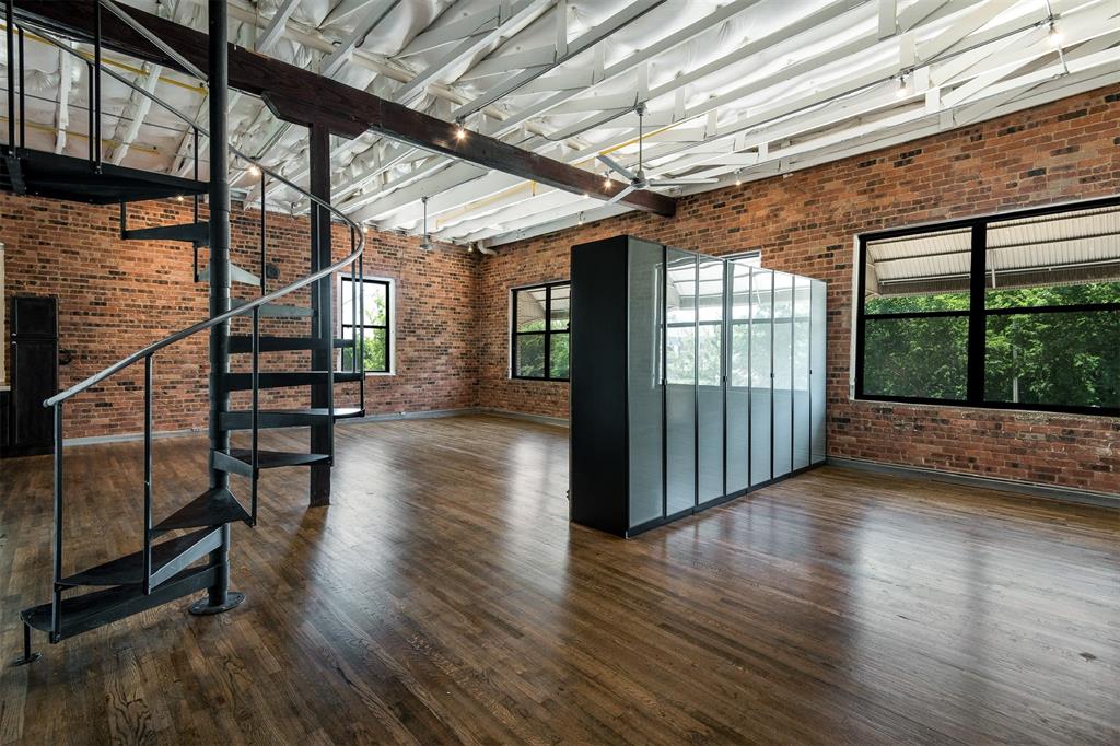 a view of a porch with wooden floor and outdoor space