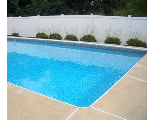 a view of swimming pool from a balcony