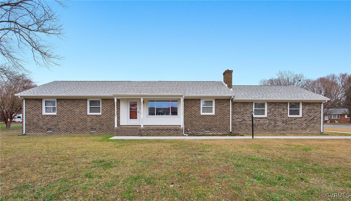 a front view of a house with yard