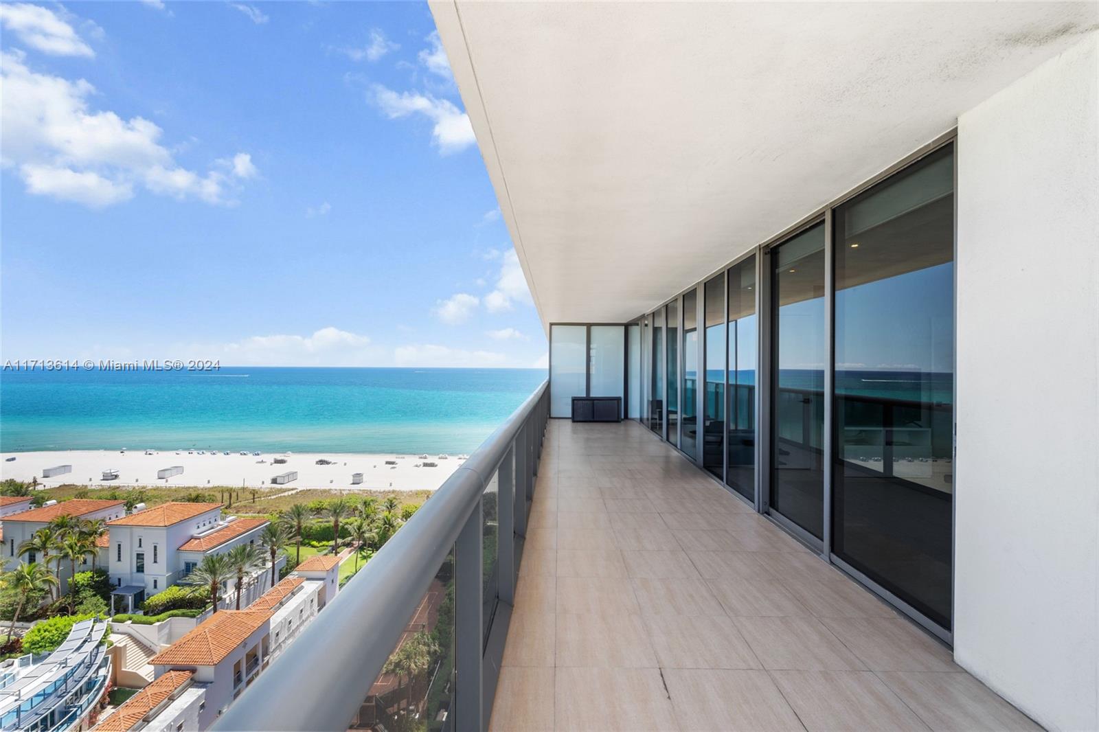 a view of balcony with furniture