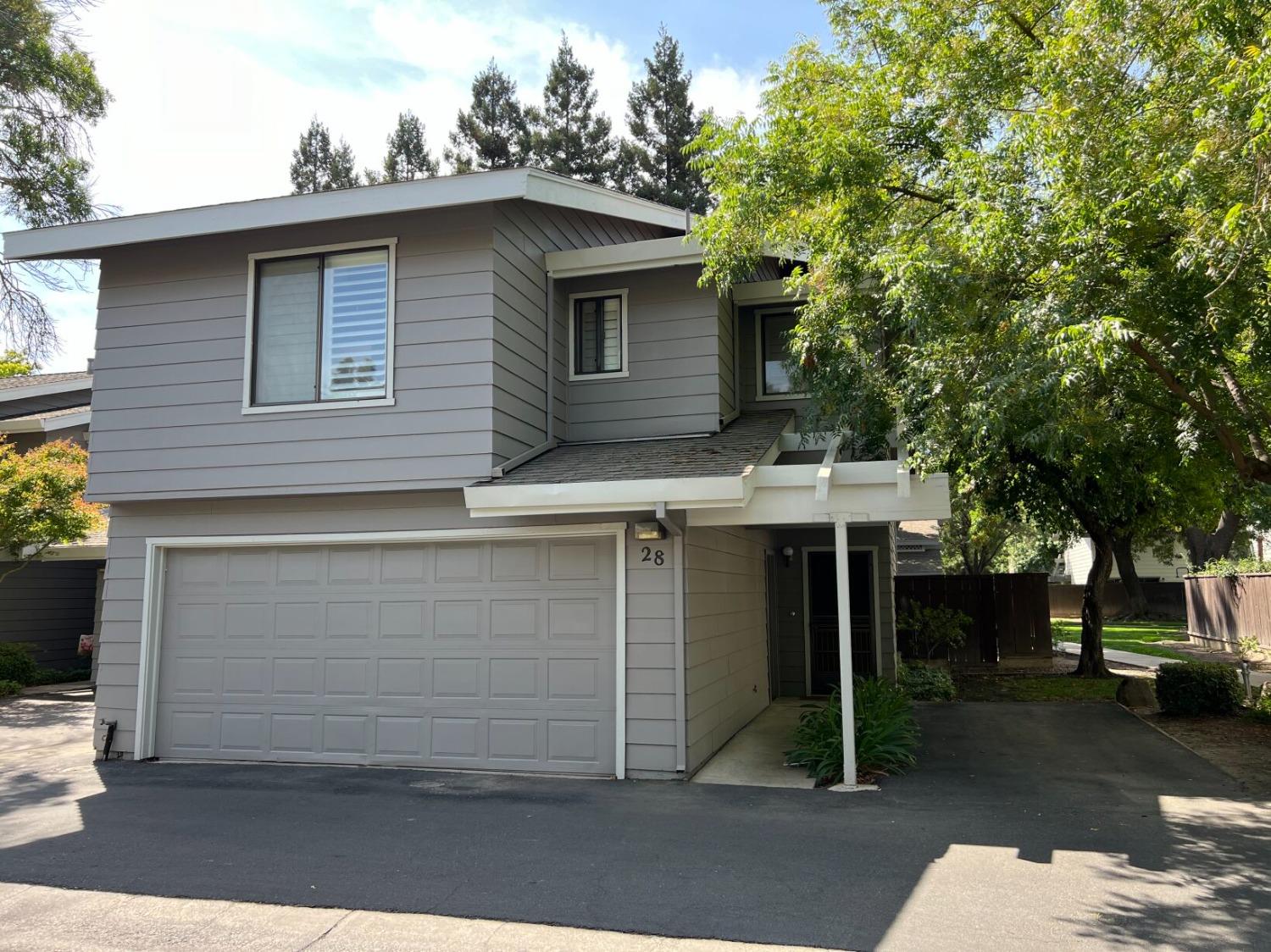 a view of a house with a garage