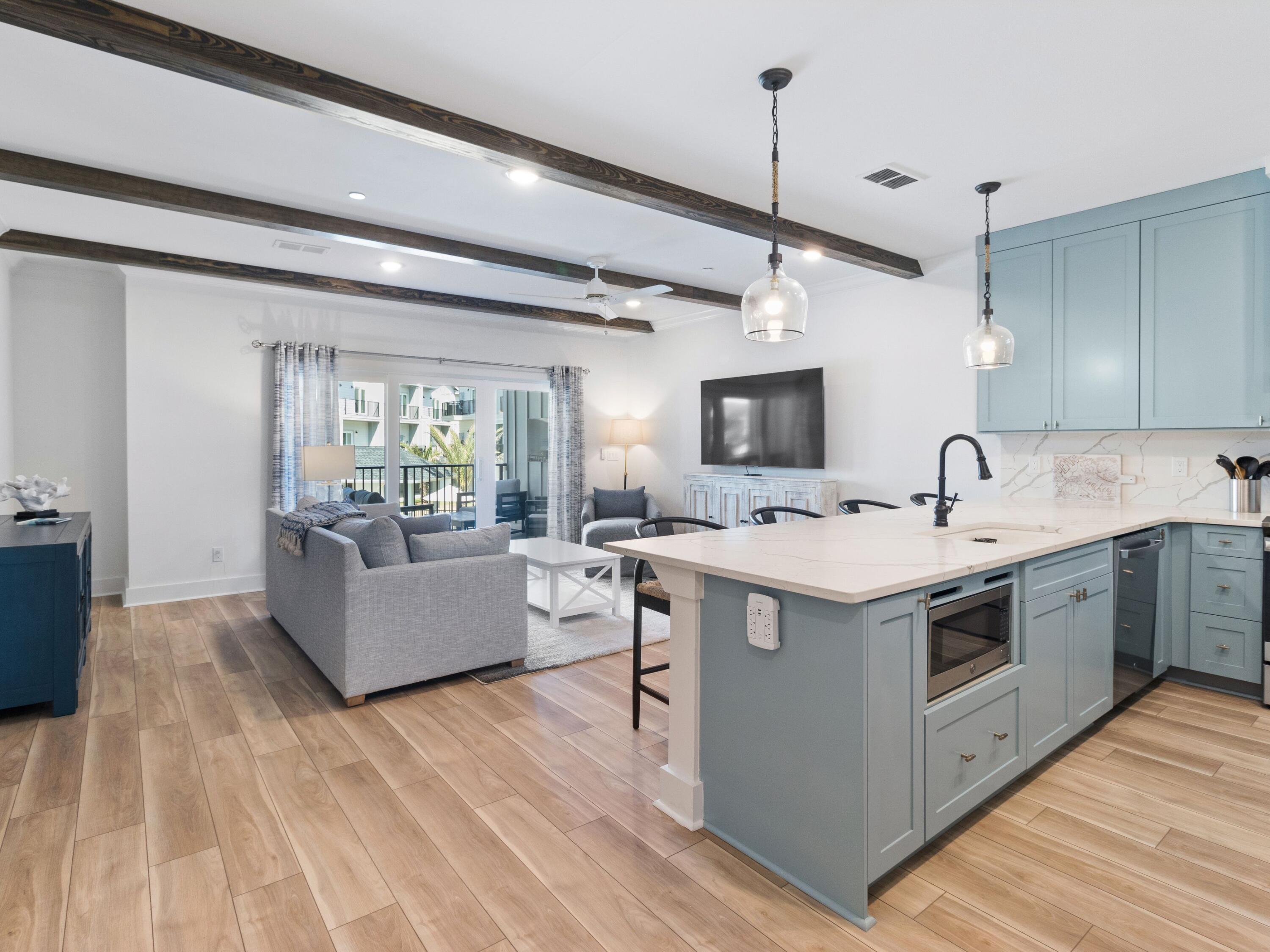 a view of living room with granite countertop furniture and fireplace