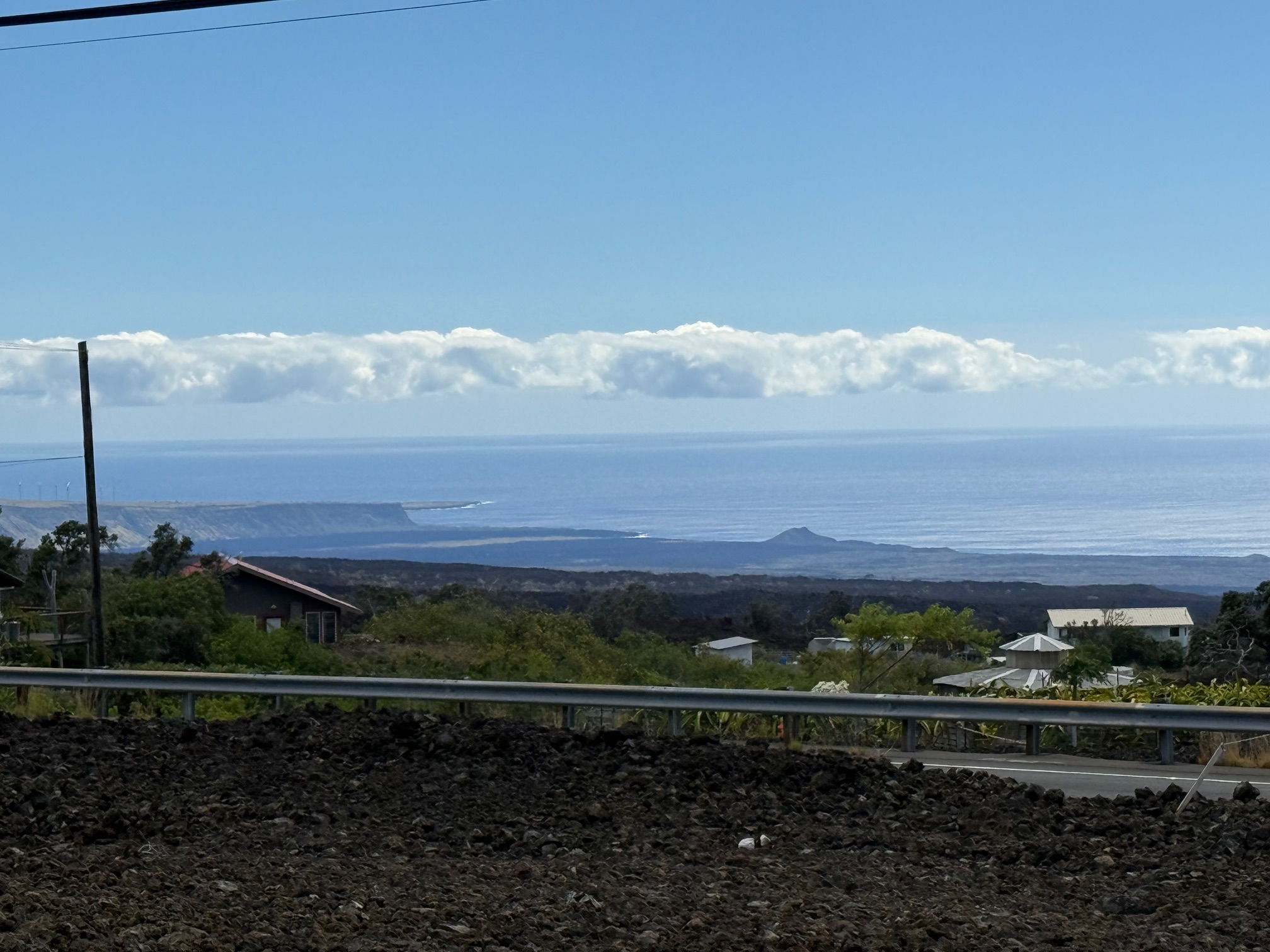 a view of a yard with an ocean