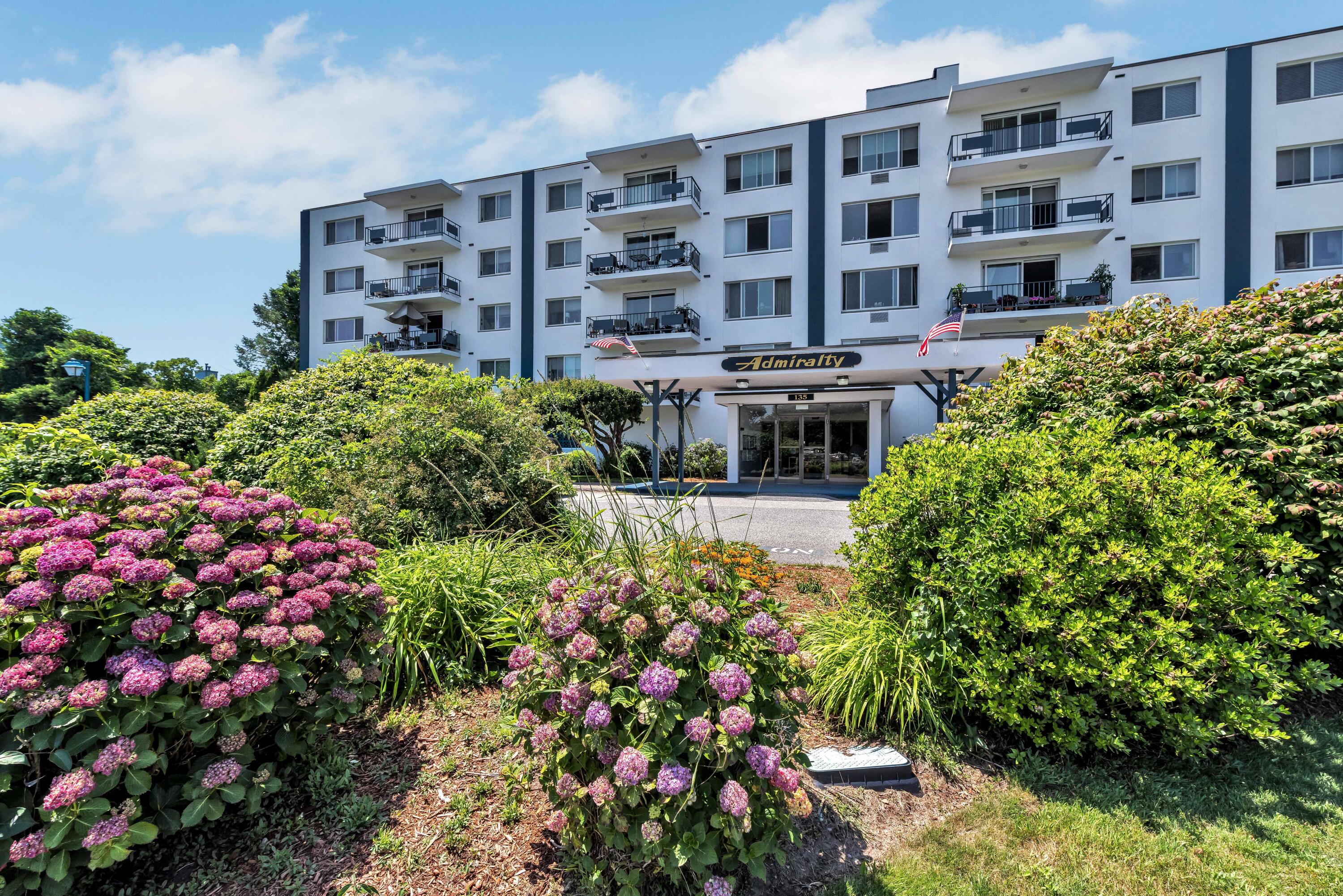 a building view with a garden space