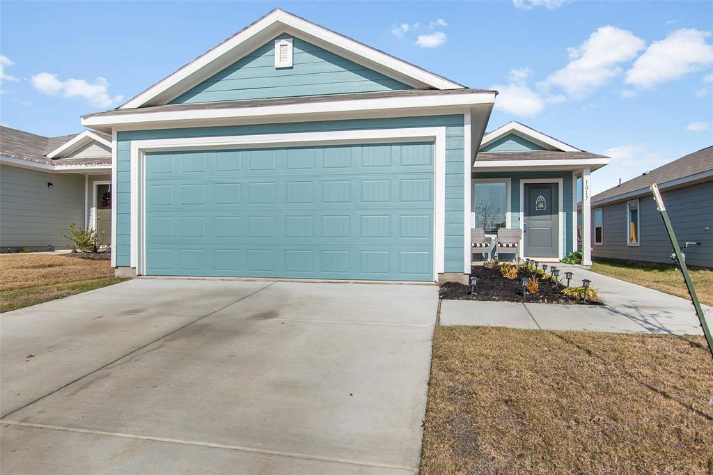 a front view of a house with patio