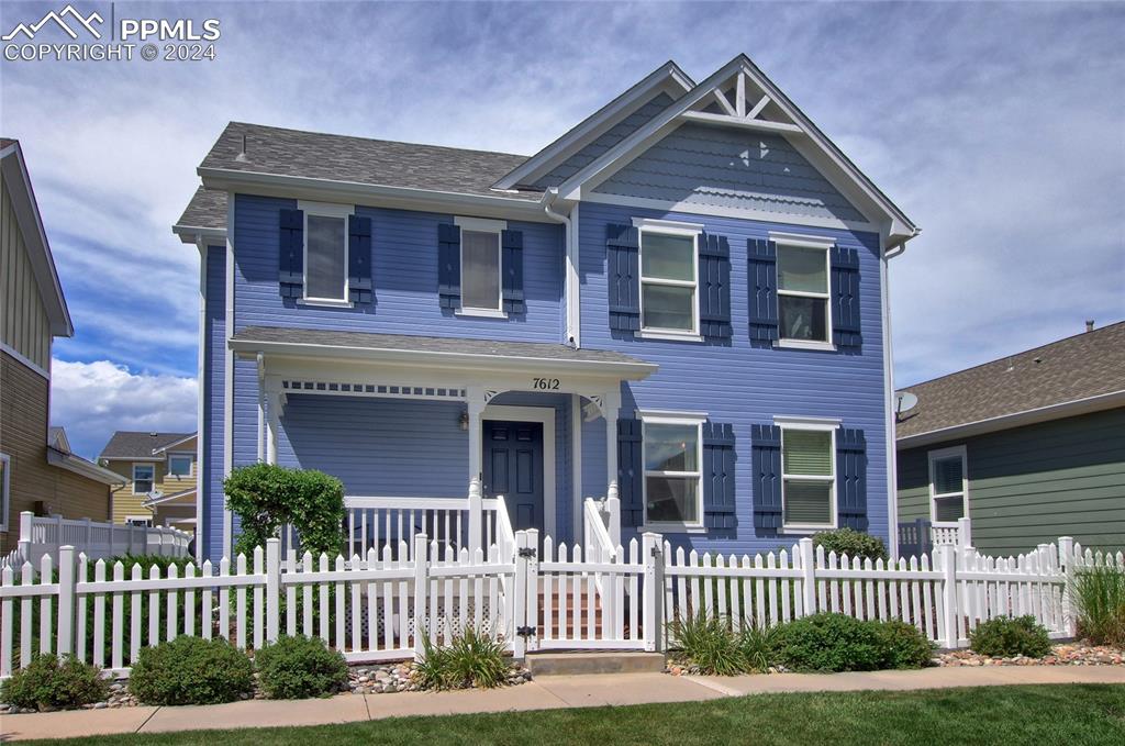 View of front of property with covered porch