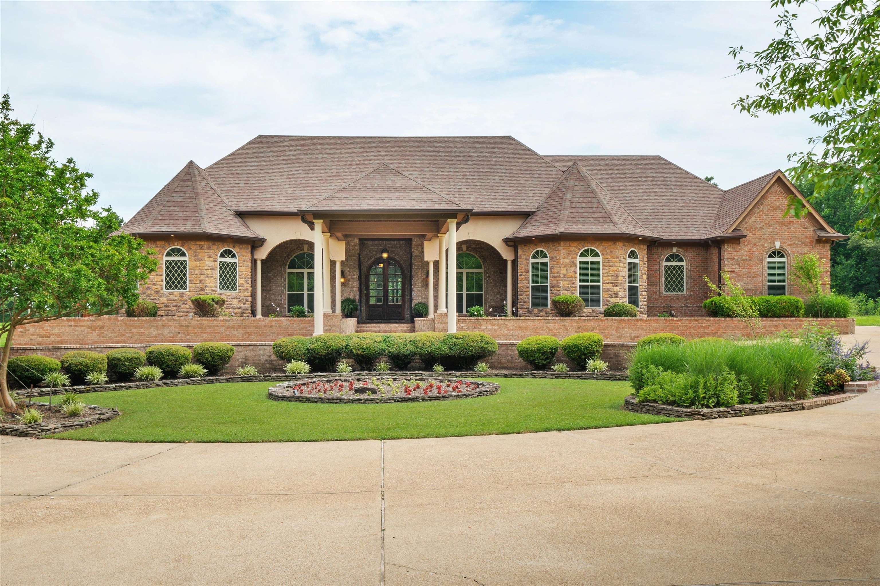 front view of a house with a yard