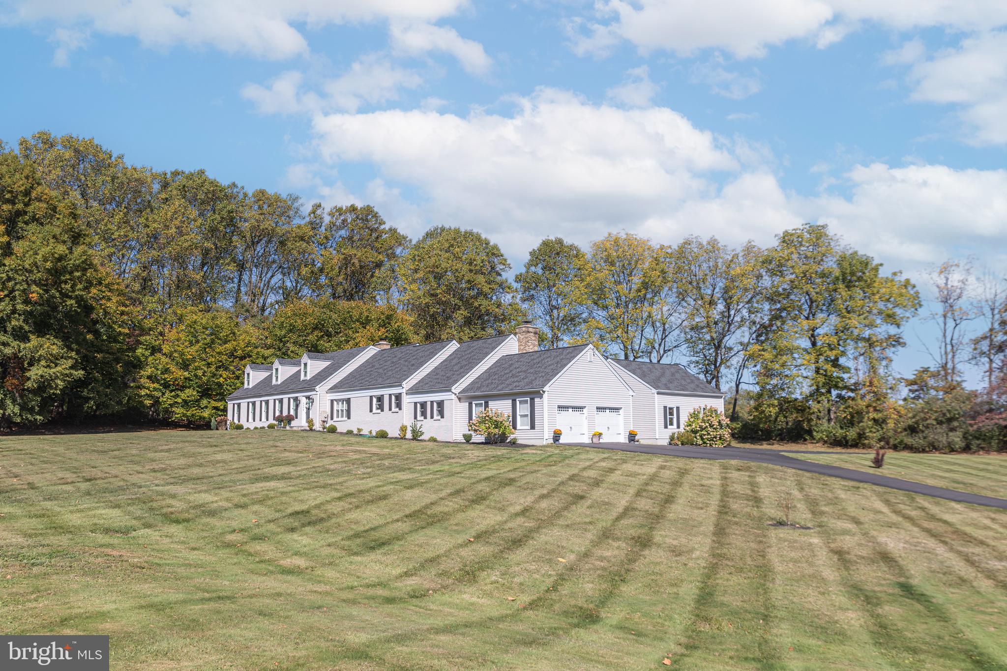 a view of house with outdoor space