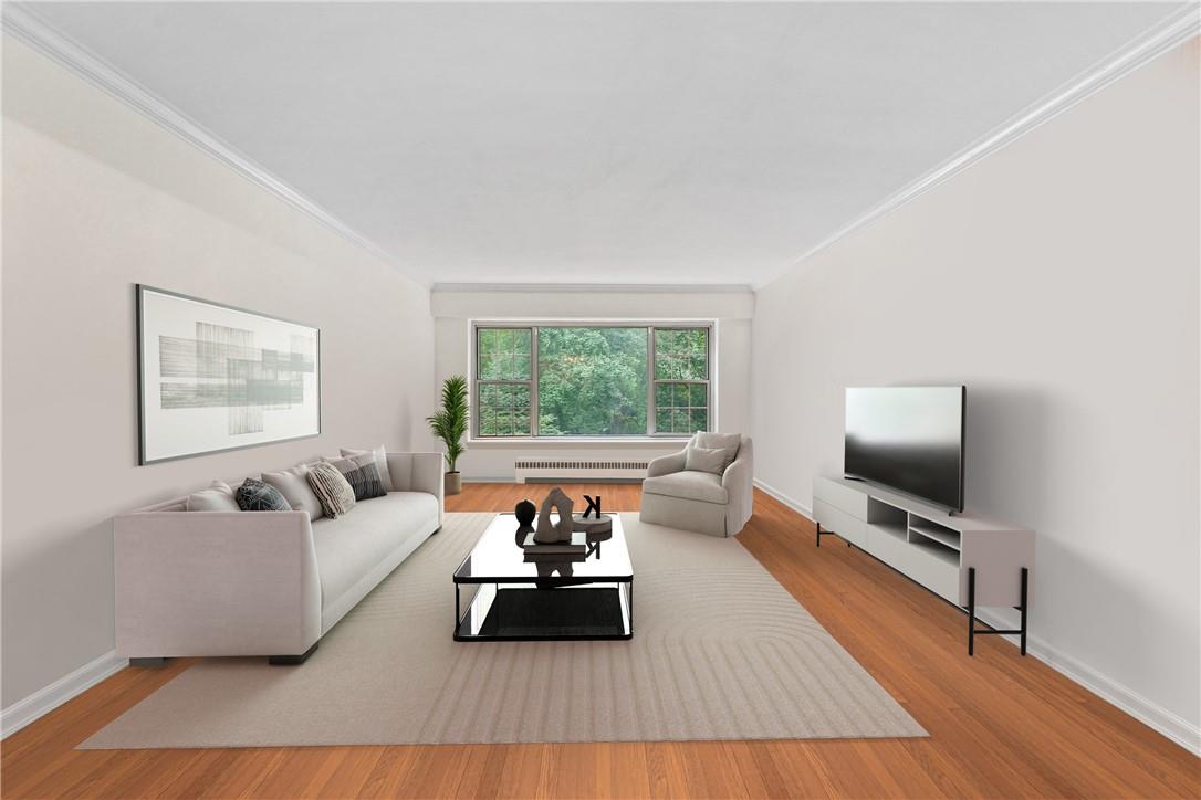 Virtually staged Living Room with park views.