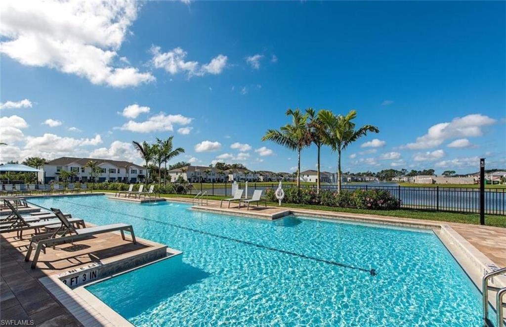 View of swimming pool with a patio area