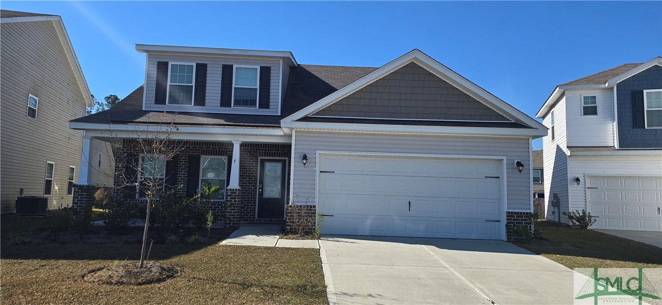 COVERED FRONT PORCH & 2-CAR GARAGE