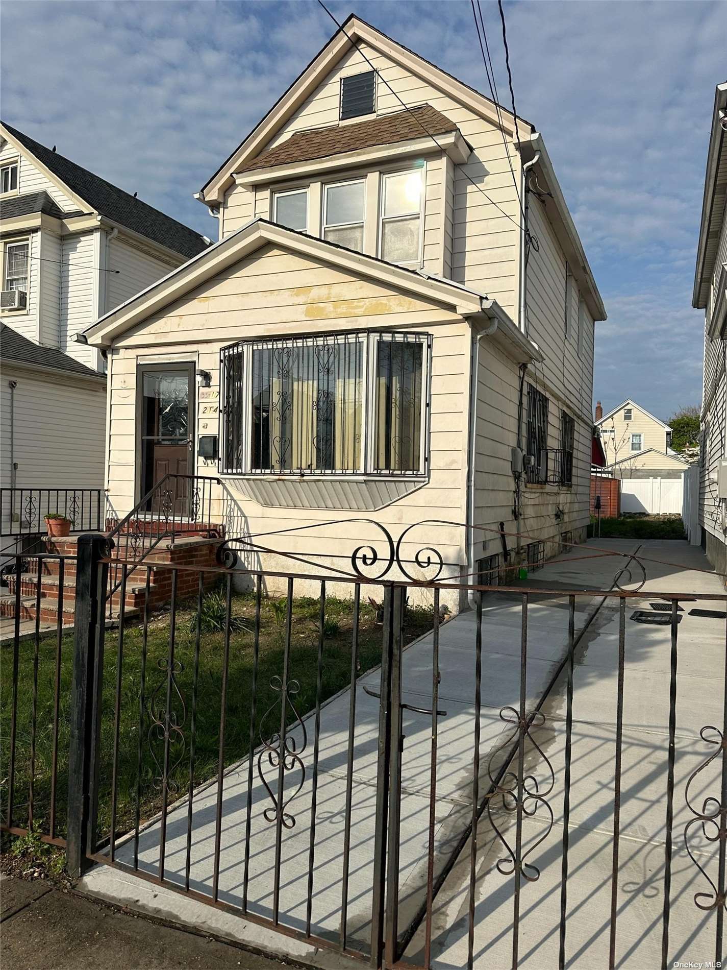 a front view of a house with balcony