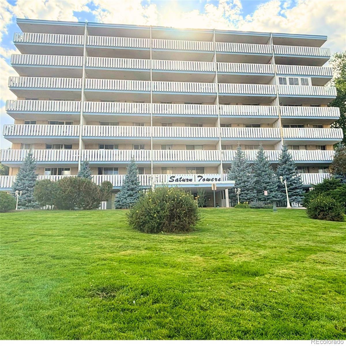 a view of a building with a garden