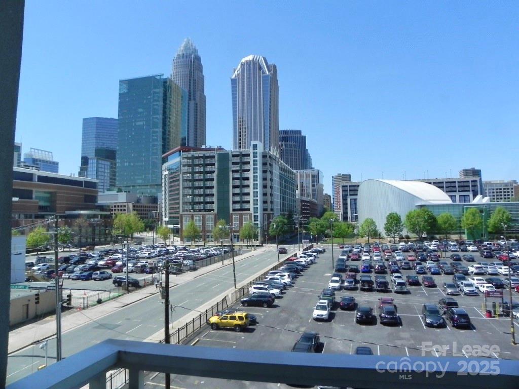 a view of a city with tall buildings