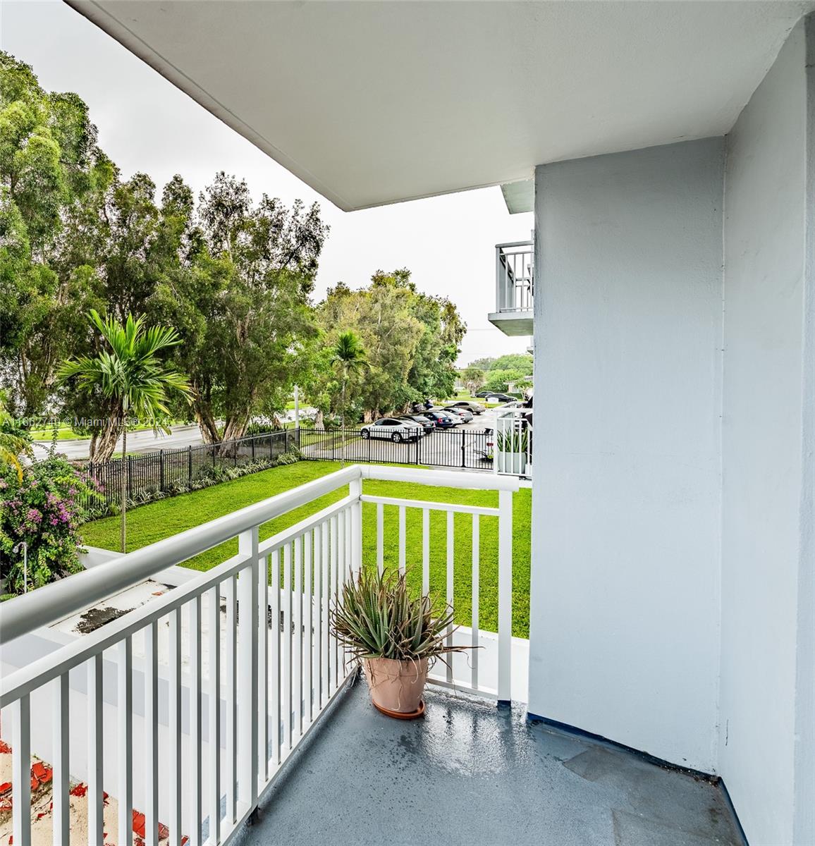 a view of balcony with furniture