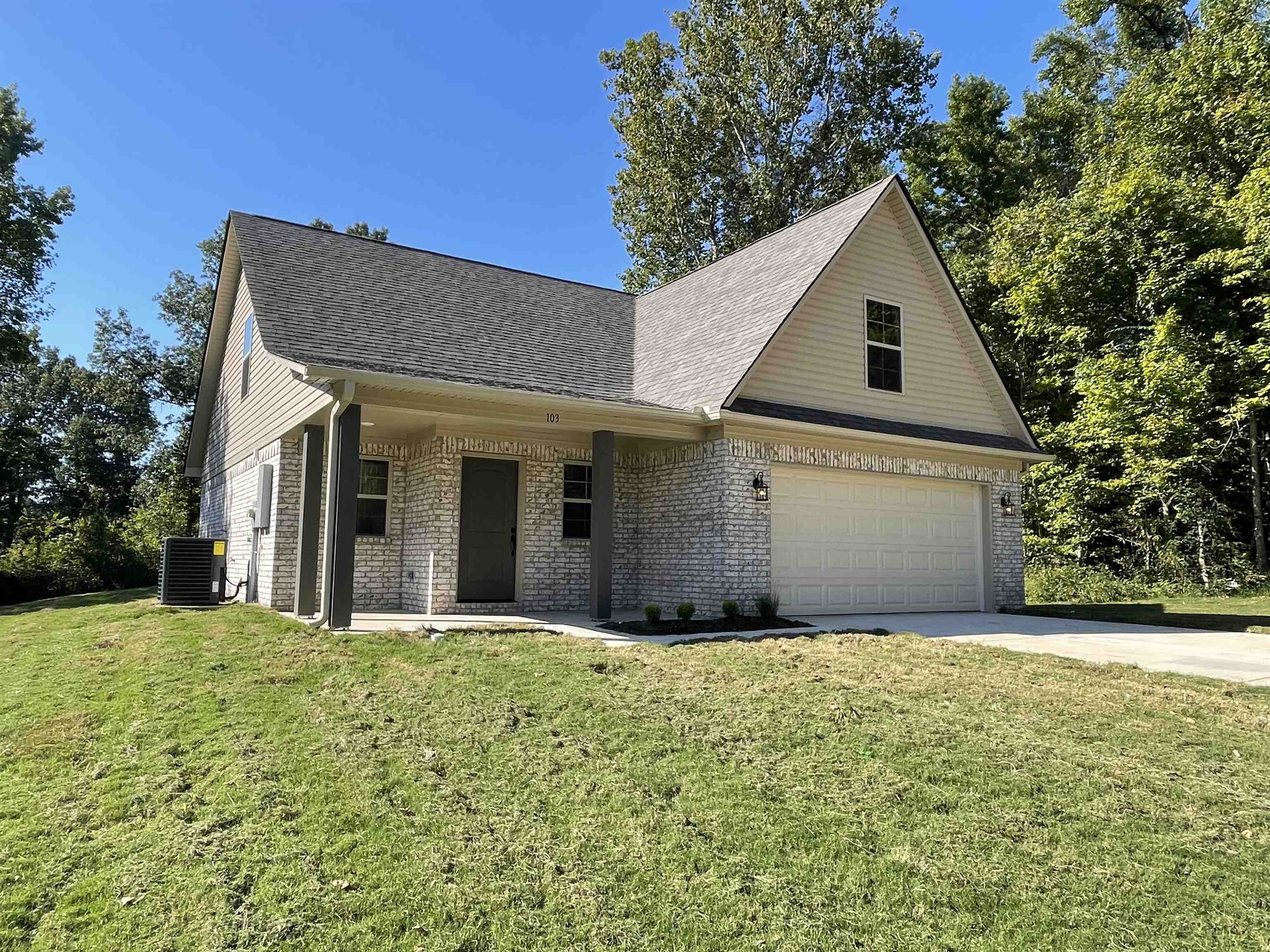 View of front of house featuring a front lawn