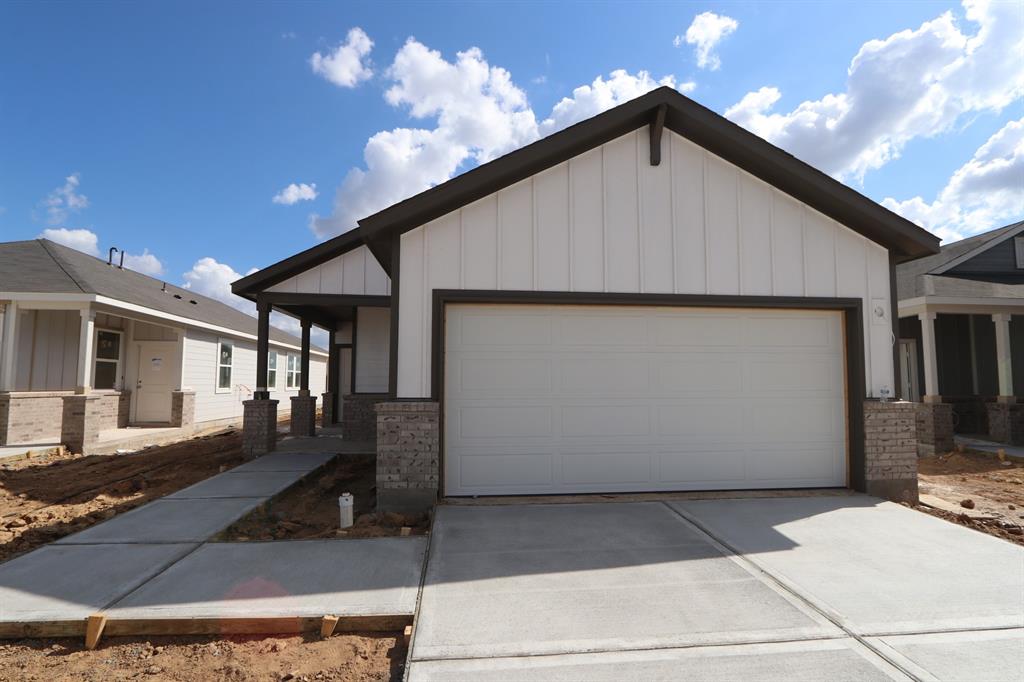 a view of a house with a garage