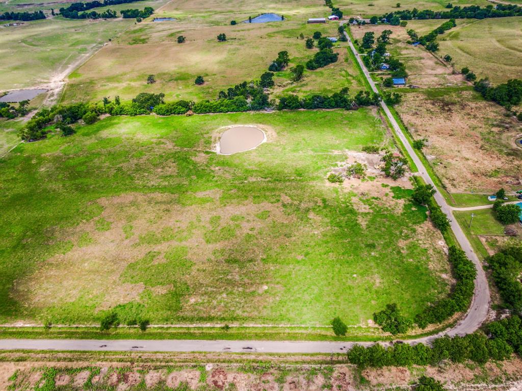 a view of a lake with a big yard