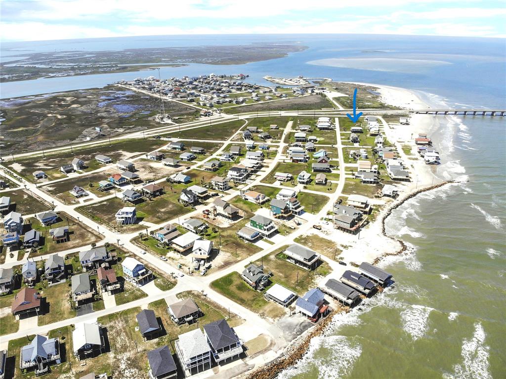 an aerial view of residential building with parking space